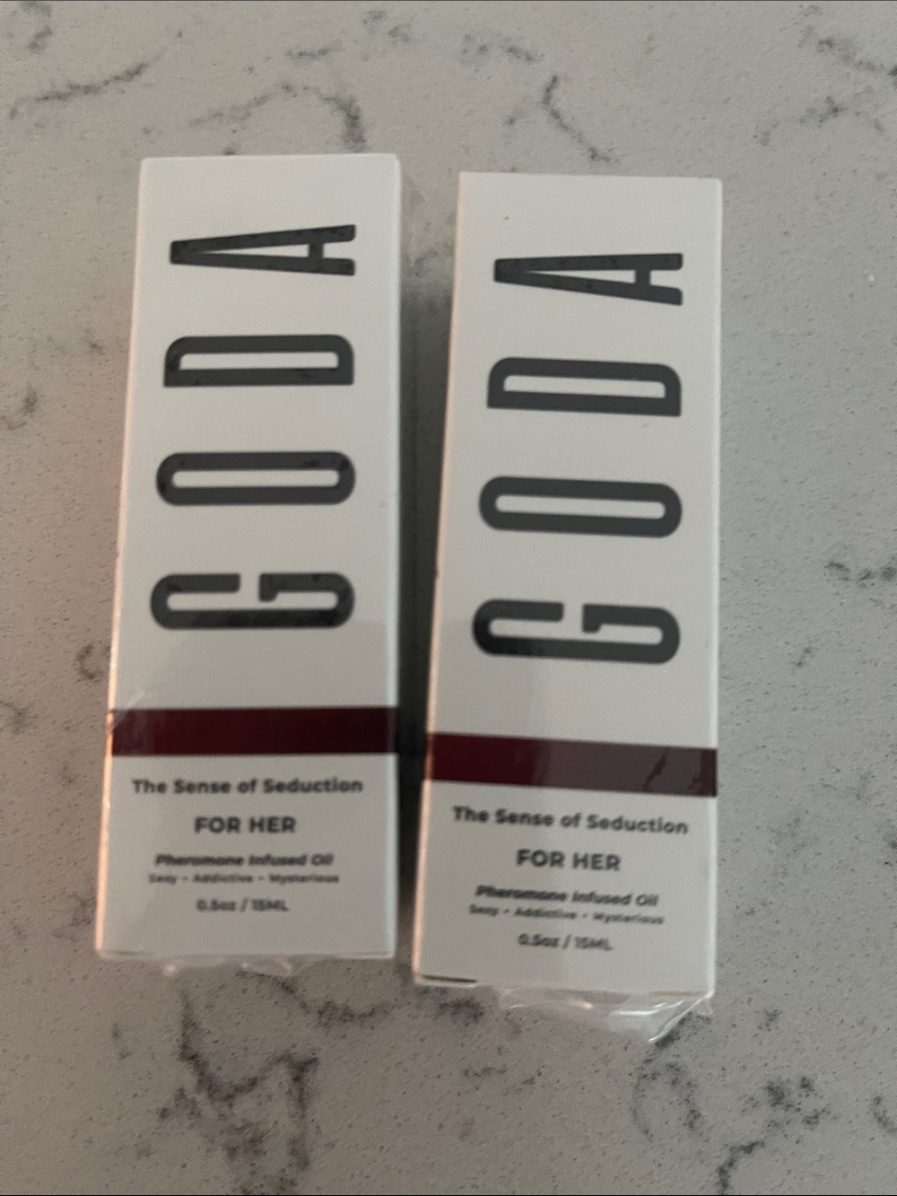 2 The Sense of Seduction For Her Pheromone Oil - White & Burgundy